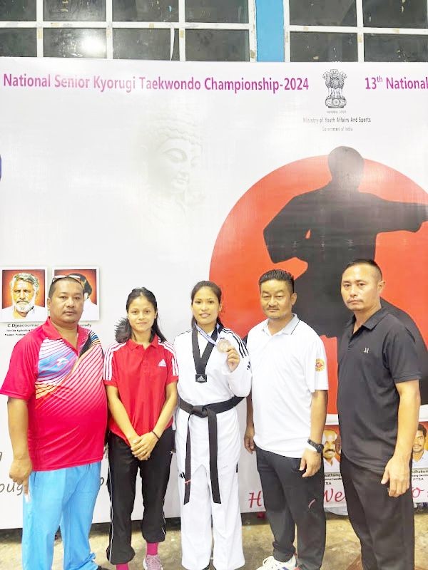 Bronze medallist Malika Baruah with others
